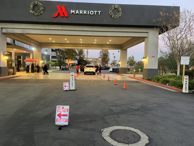 AVPR hotel valet setup with directional signs, cones, and an organized arrival lane
