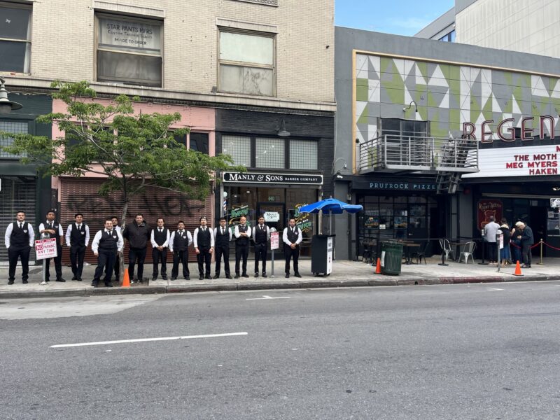 Uniformed AVPR valet team staged along a Downtown Los Angeles curb