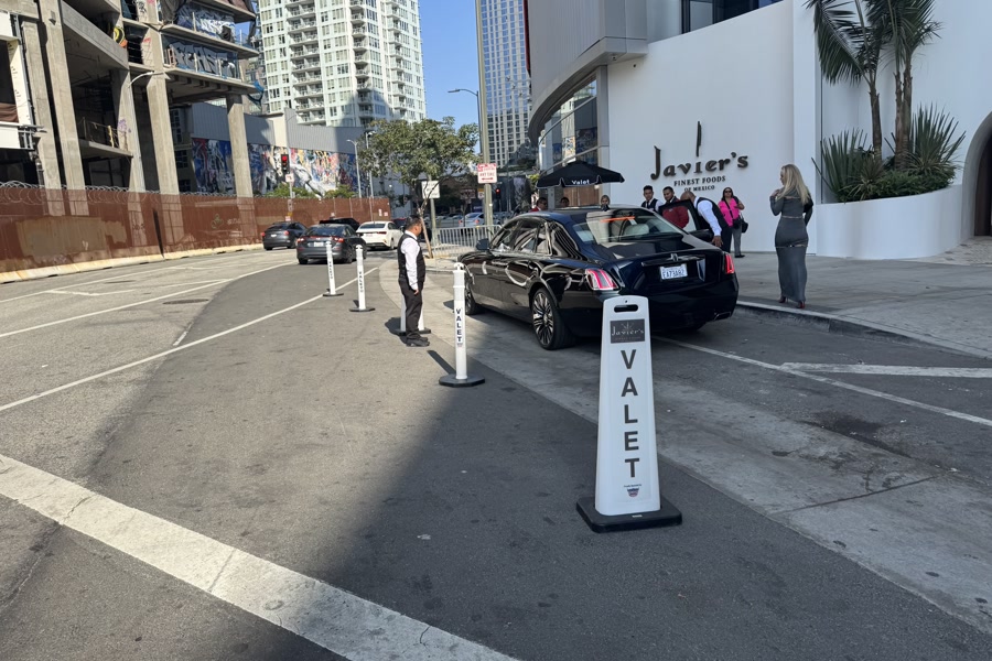 American Valet attendants coordinating a Los Angeles restaurant arrival